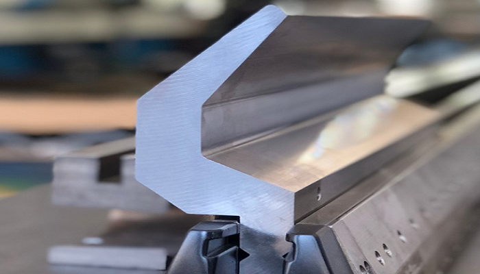 Close-up of a durable TRUMPF / WILA punch tooling, showcasing its hardened steel construction and polished finish